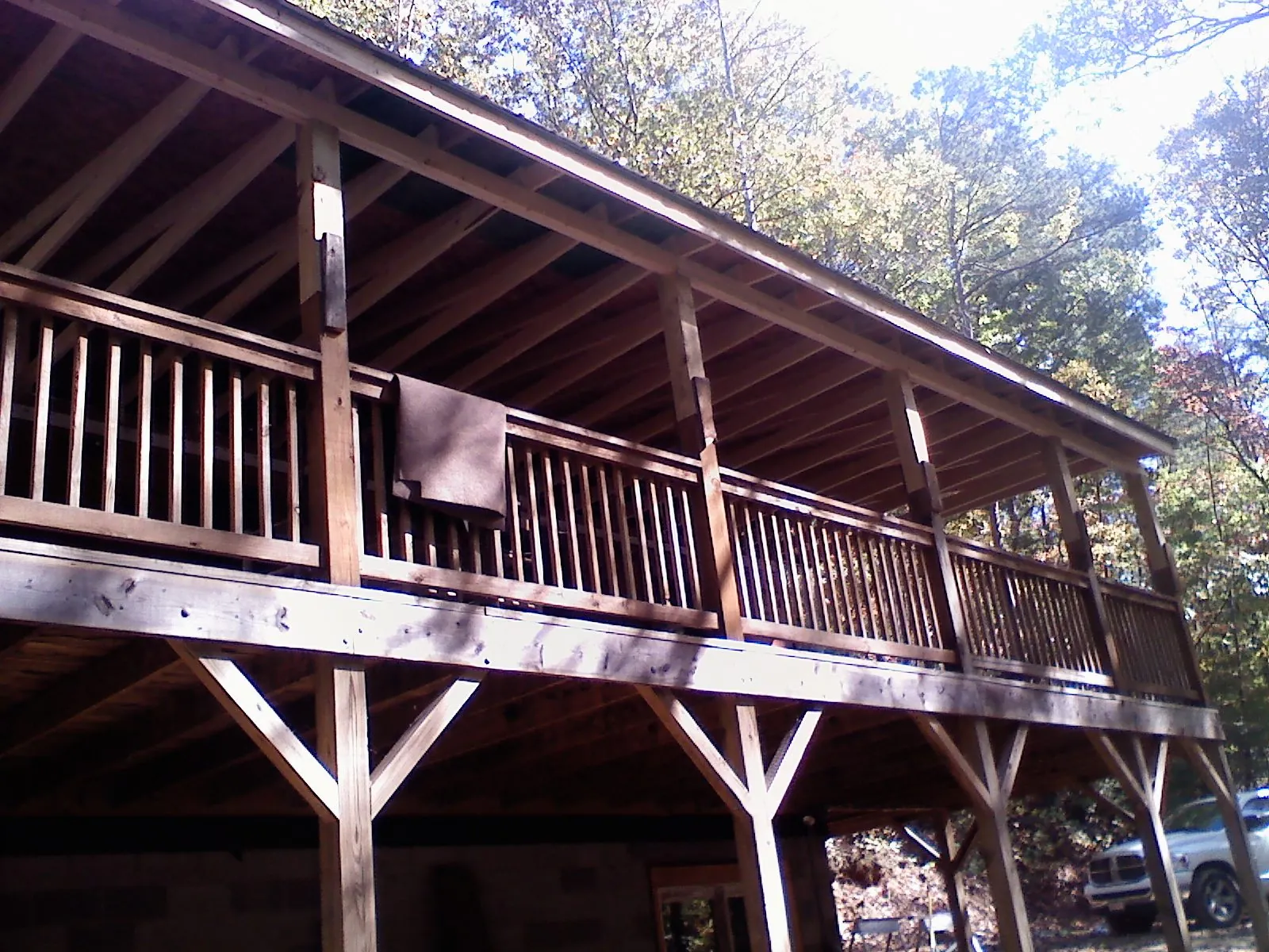Timber framing under a new elevated porch and deck — Roof Leak Repair in Burbank by Roofing Brothers